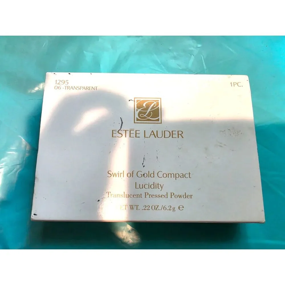 1990's Estee Lauder Lucidity Swirl of Gold 